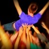Crowd surfer by Mavis via Flikr
