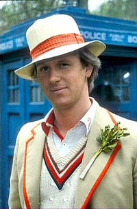 The Fifth Doctor sporting a decorative vegetable.