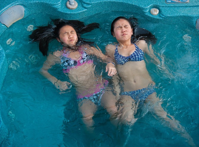 Twins from China raised separately in Canada