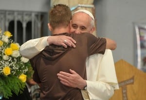 Pope Francis embraces patient courtesy Wikimedia user Tomaz Silva/ABr