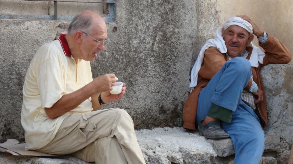Fr. Frans eating ice cream during a pilgrimage in Syria. I took this photo while we stopped to take a breath after a crazy (off road) walk. Fr. Frans (75 years old here)  was always inspiring young Syrians by his capability and endurance to lead the pilgrimage like he was the youngest one in the group. Photo by Tony Homsy