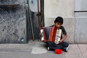 The Busker, Child Portrait, Mexico City / Flickr User Geraint Rowland, Flickr Creative Commons