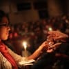 Passing the Light at IFTJ / Image: Ignatian Solidarity Network